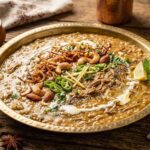 haleem dish with fried onions